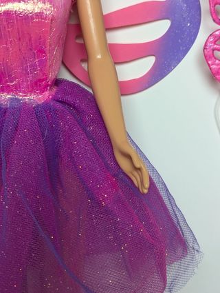Muñeca Barbie flying butterfly