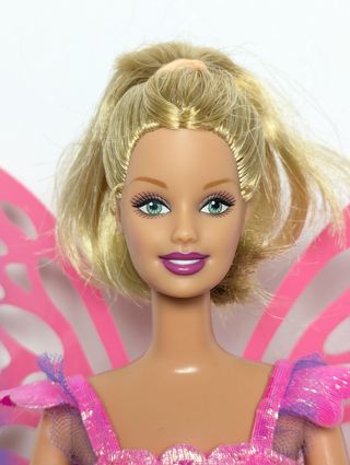 Muñeca Barbie flying butterfly