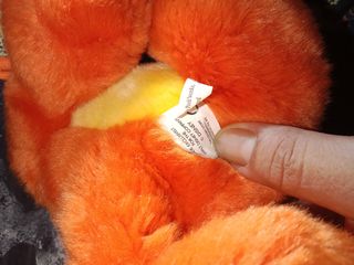 Peluche perro naranja