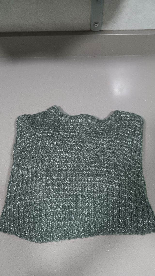 Chaqueta gris con cremallera