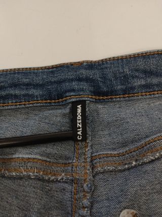 Jeans donna blu con spacchi