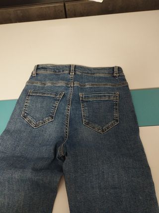 Jeans donna blu con spacchi