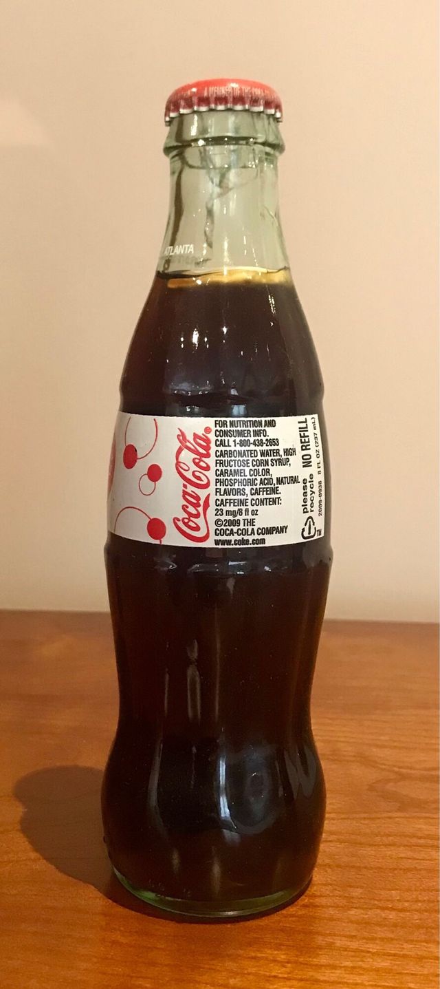 Bottiglia Coca-Cola World of Coca-Cola 8oz