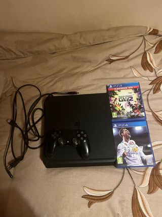 PS4 (PlayStation 4) con mando y 2 juegos