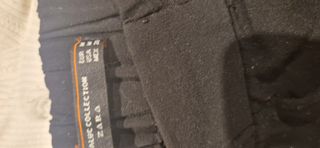 Conjunto pantalón negro y sudadera estampada