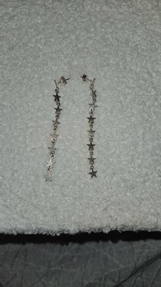 Pendientes largos de estrellas.