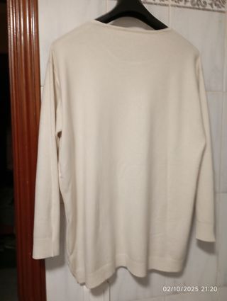 Jersey beige con bolsillos brillantes