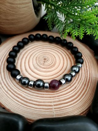 Pulsera elástica negra y plateada