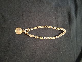 Pulsera plata con colgante