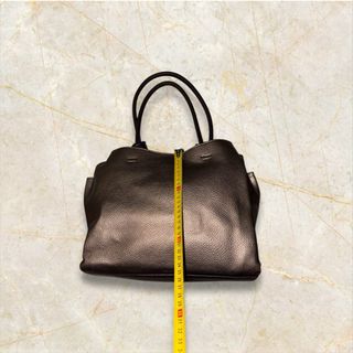 Bolso Parfois elegante marrón y dorado