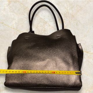 Bolso Parfois elegante marrón y dorado