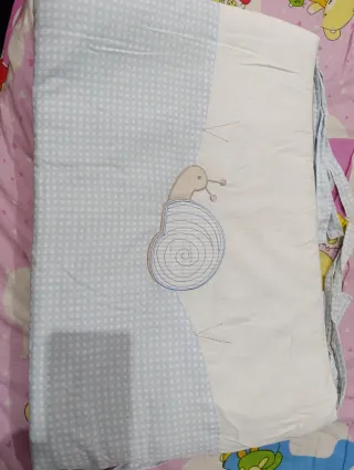 Laterales para cuna con diseño de caracol