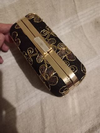 Bolso de fiesta negro y dorado