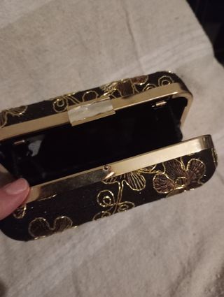Bolso de fiesta negro y dorado