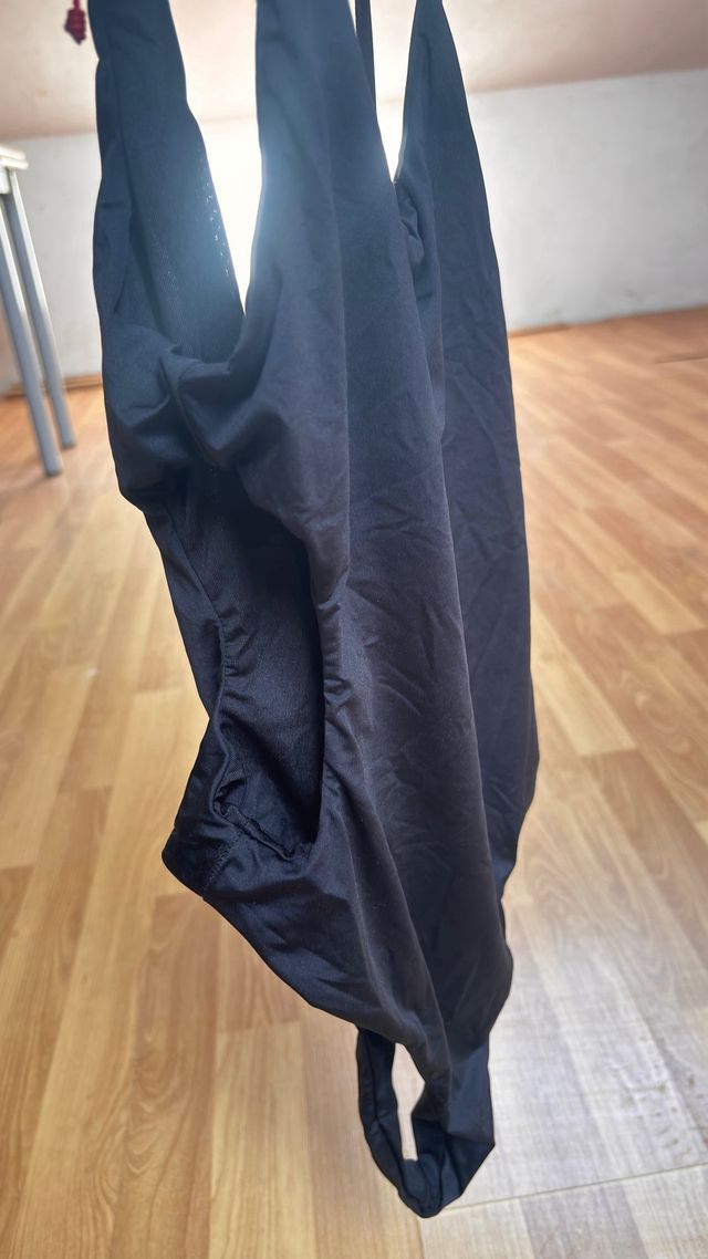 Blusa rosa y más blusas y un body negro