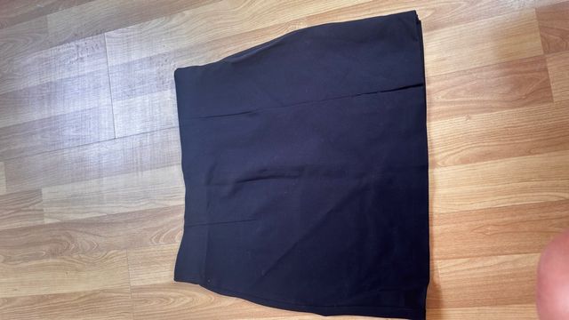 Minifalda negra y falda short 4 prendas