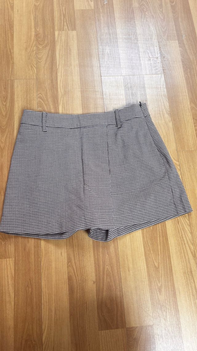Minifalda negra y falda short 4 prendas