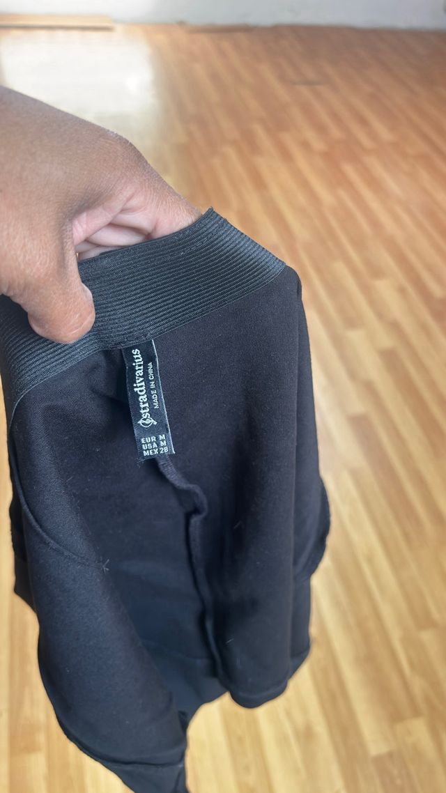 Minifalda negra y falda short 4 prendas