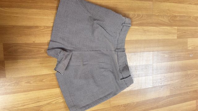 Minifalda negra y falda short 4 prendas