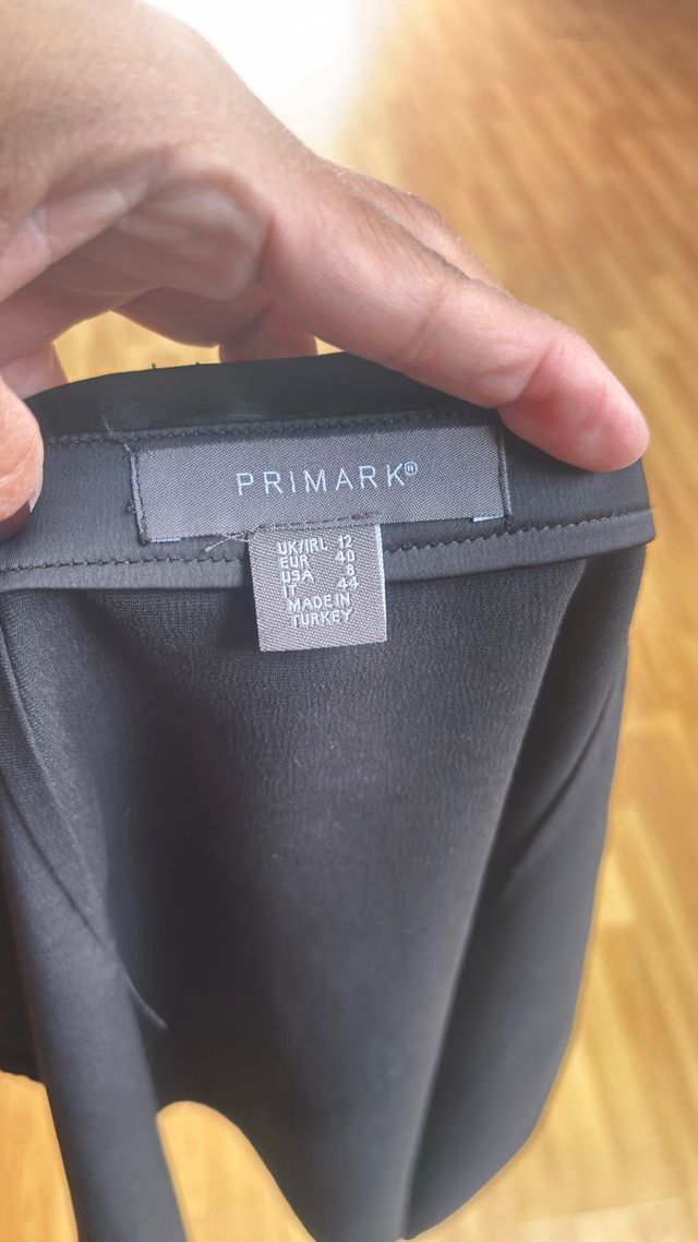 Minifalda negra y falda short 4 prendas