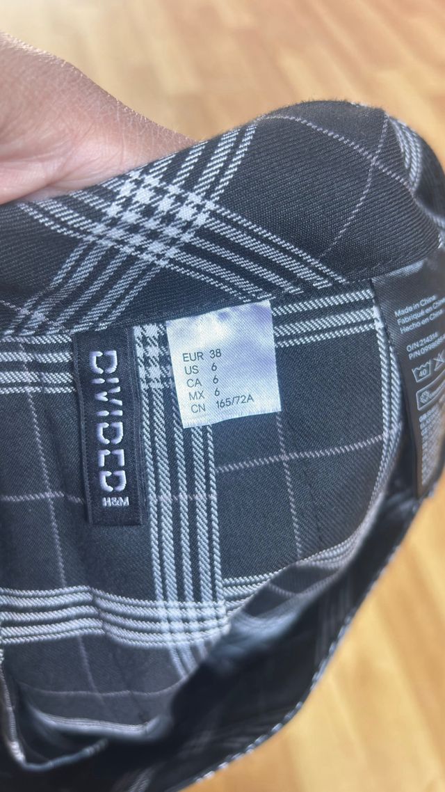 Minifalda negra y falda short 4 prendas