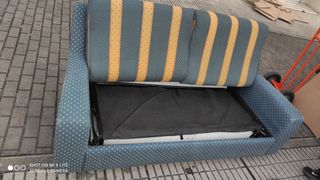 Sofá cama tela azul y amarillo con colchón 