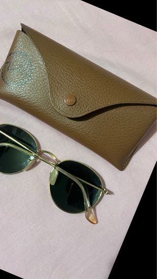 Gafas de sol Ray-Ban redondas doradas