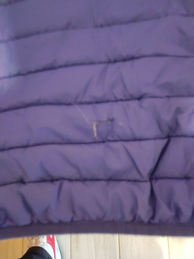 Piumino blu con interno multicolor