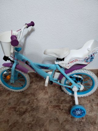 Bicicleta infantil Frozen con ruedines.