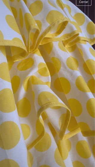 Traje de flamenca amarillo y blanco