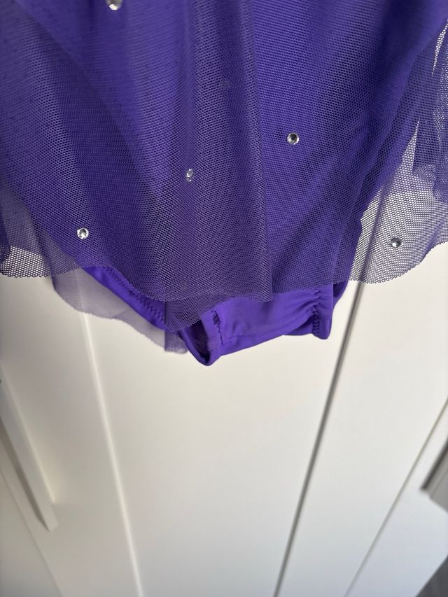 Malla de patinaje morada y amarilla