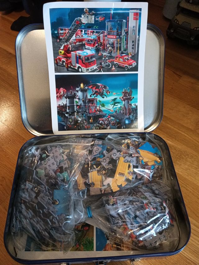 4 Puzzles de Playmobil con maletín metálico 