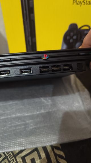 PlayStation 2 Slim Negra + Juegos y Accesorios