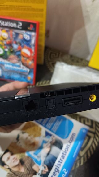 PlayStation 2 Slim Negra + Juegos y Accesorios