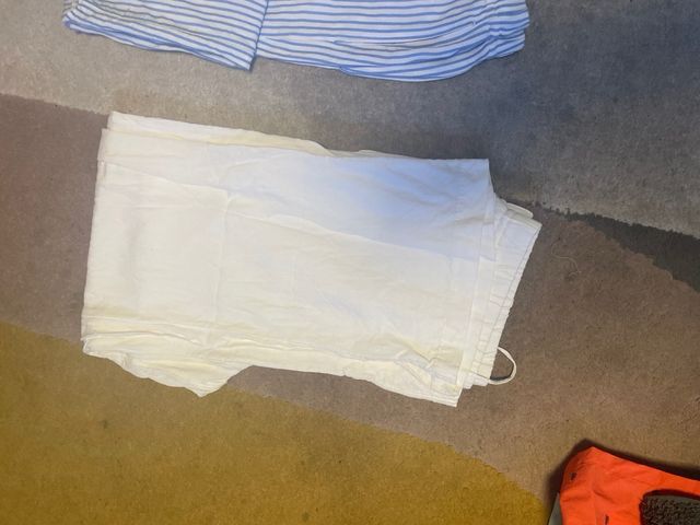 Pantalones de lino Nike rayas blanco y negro