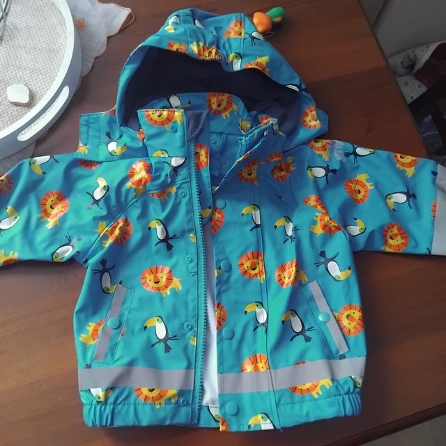 Giacca pioggia bimbo con leoni e tucani
