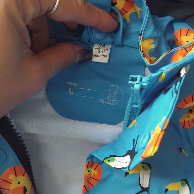 Giacca pioggia bimbo con leoni e tucani