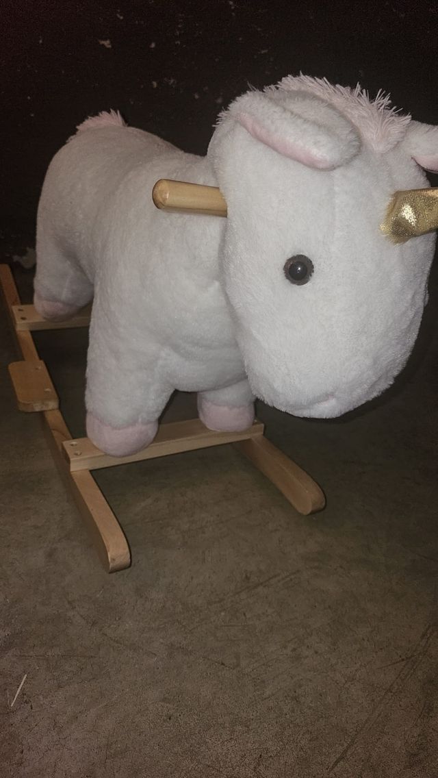 Caballito balancín unicornio peluche