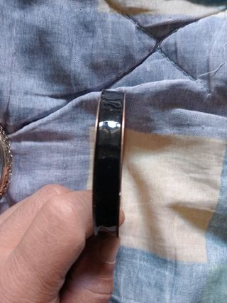 Pulsera negra y dorada
