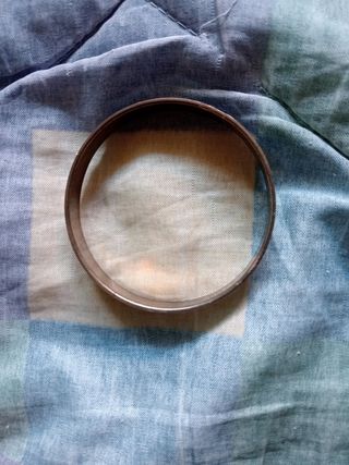 Pulsera negra y dorada