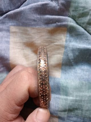 Pulsera negra y dorada