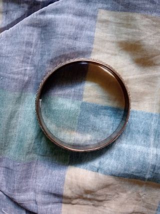 Pulsera negra y dorada