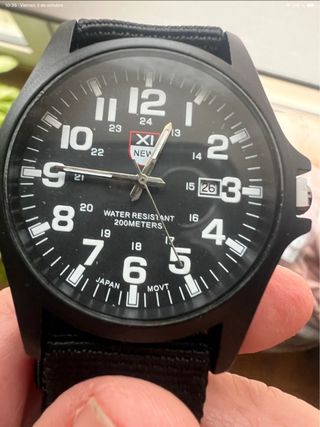 Reloj XI Cuarzo estilo militar.