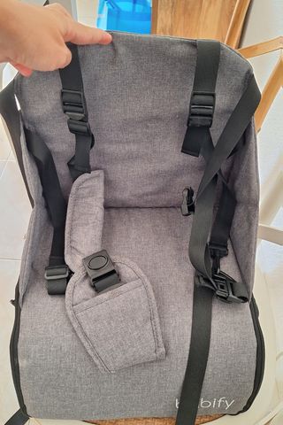 Trona de viaje Babify con bolsillos