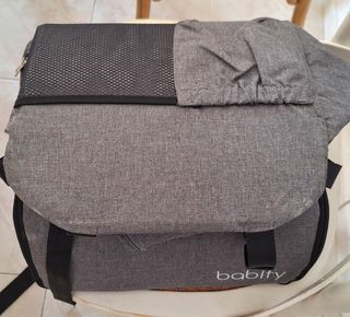 Trona de viaje Babify con bolsillos