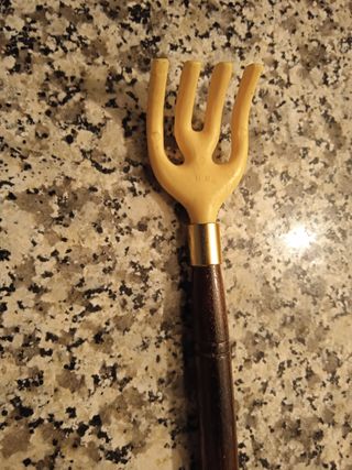 Rascador de espalda manual