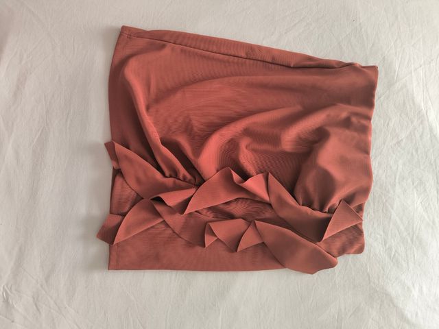 Falda mini rosa con volantes