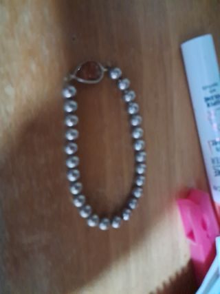 Pulsera de cuentas naranja y plata