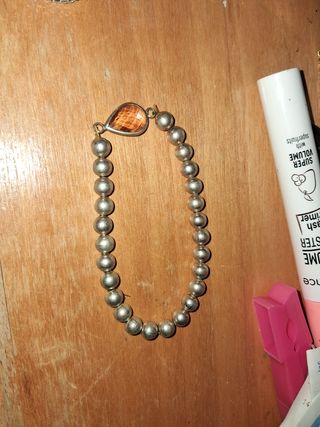 Pulsera de cuentas naranja y plata
