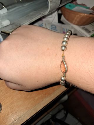 Pulsera de cuentas naranja y plata